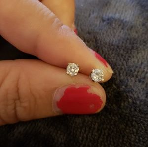 14 k gold diamond studs with real diamonds.
